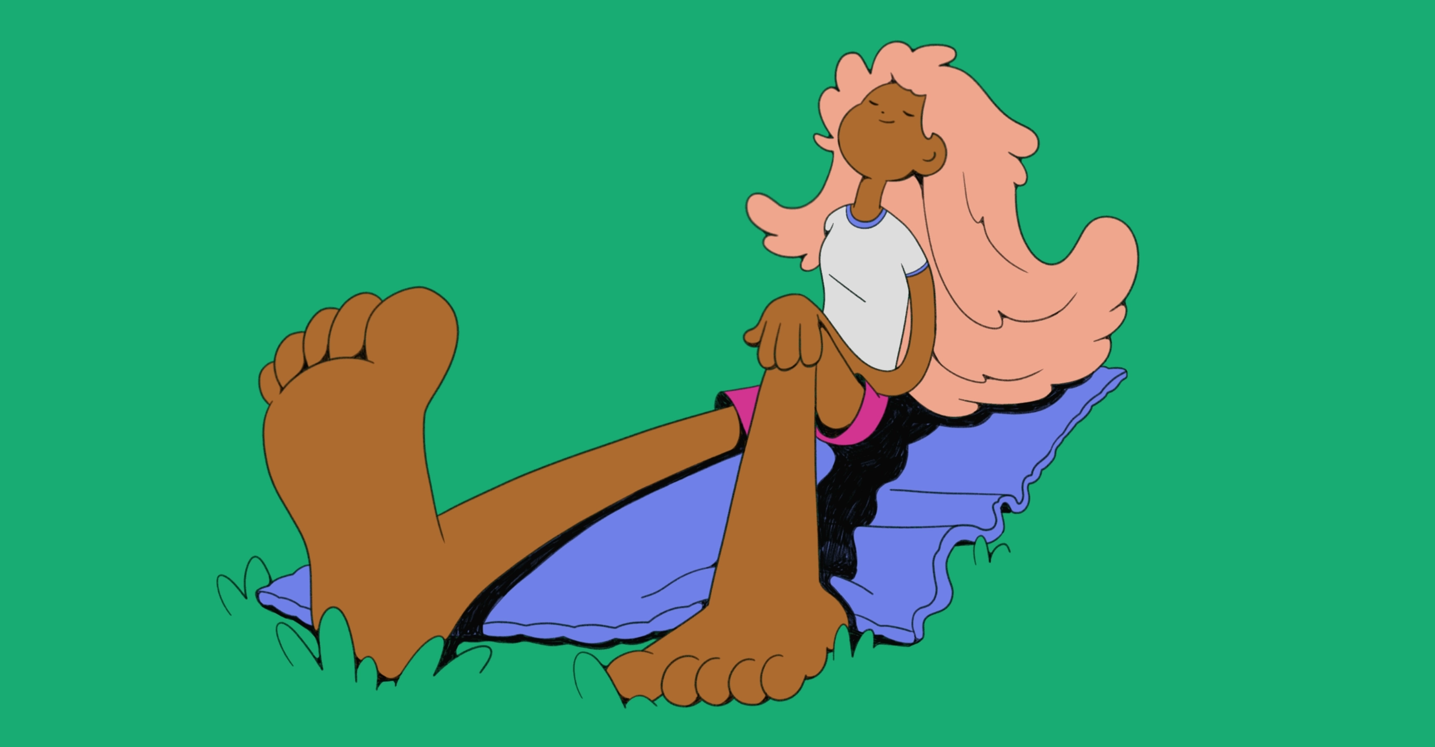 orange hair girl on a picnic blanket in the grass